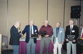 President Jack Rencher with Harry Gobrecht, Gary Moncur, Eddie Deerfield and Ed Miller - Awardees of the 303rd BG Presidental Heritage Award for 2002
